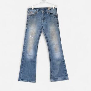 Y2K Ariat bootcut jeans distressed faded thrashed mid blue wash relaxed wide leg